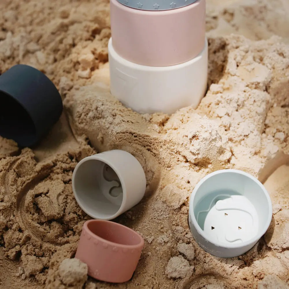 Silicone stack and pour nesting cups in the sand