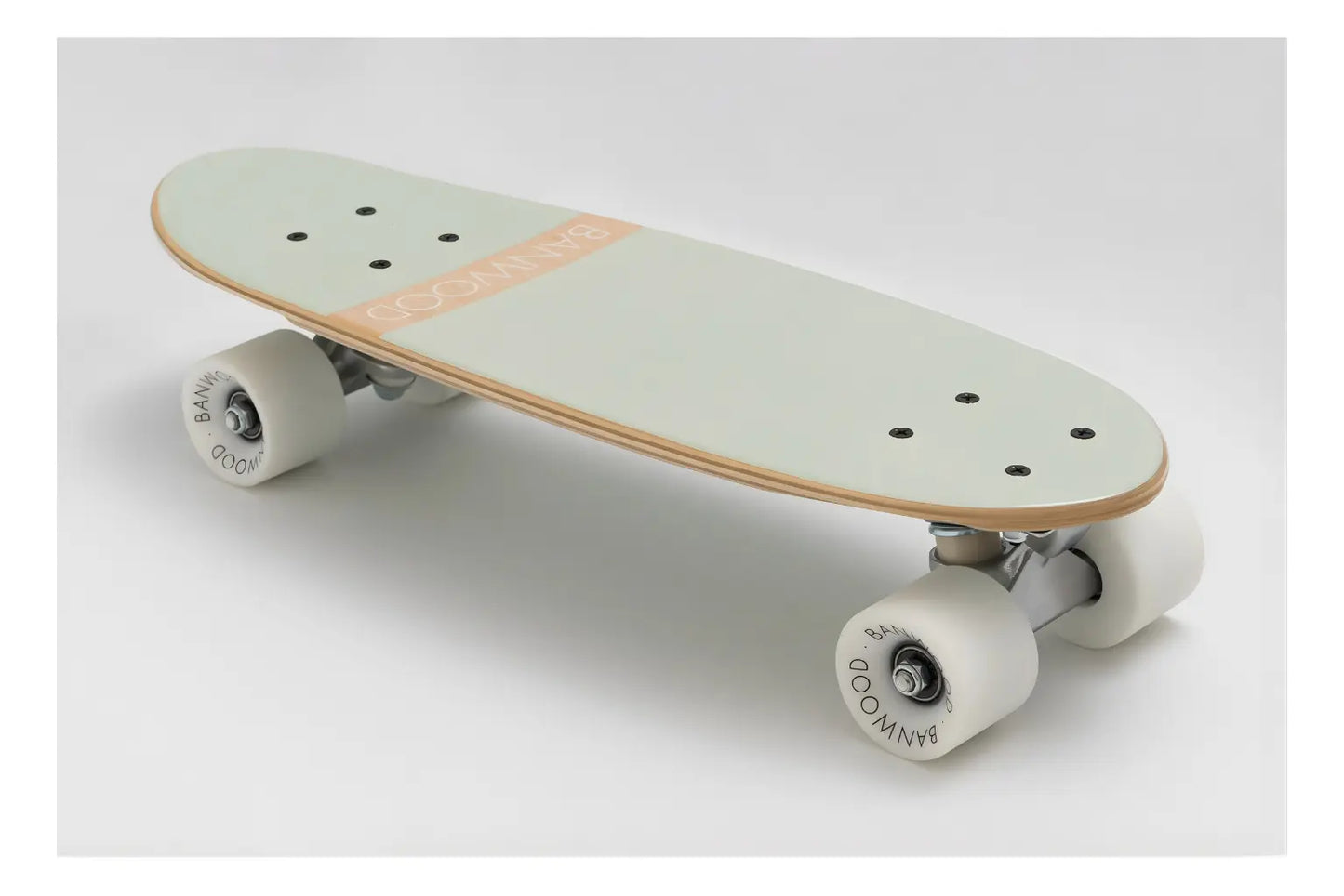 Skateboard with a light green deck and white trucks on a white background