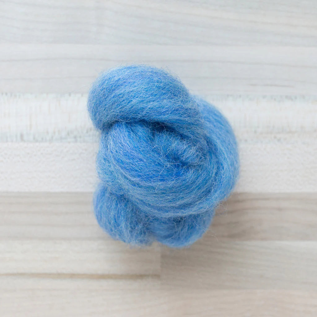 Sky Blue Wool Roving Felter's Flowing on tabletop