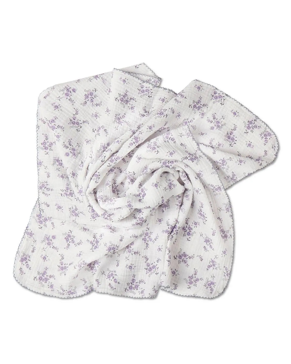 Folded floral cotton baby blanket for swaddling or play