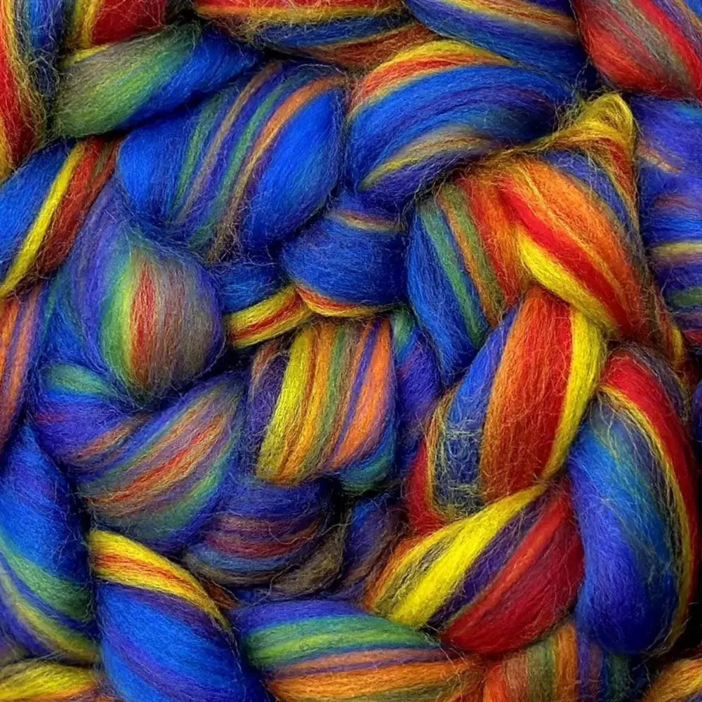 spinning colorful yarn from Merino wool top fiber in Rainbow