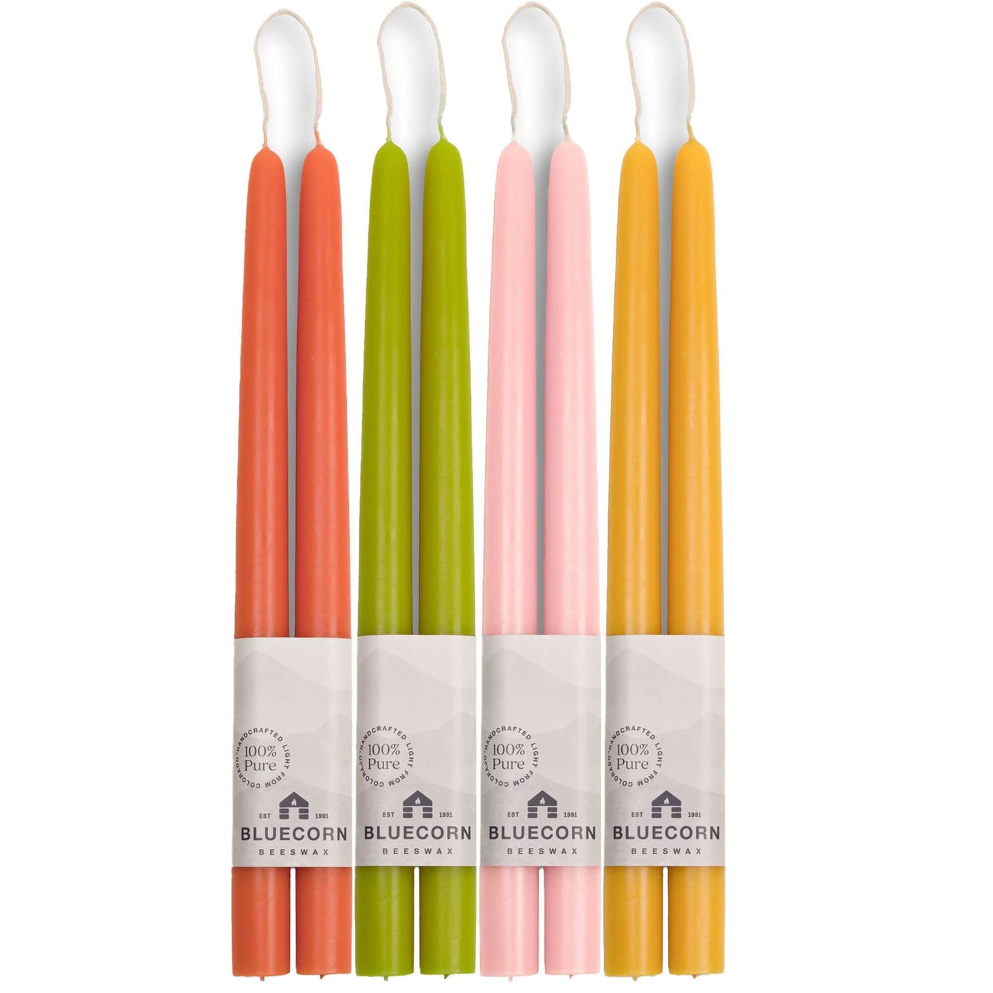 Set of colorful baby spoons with Bluecorn branding on a white background