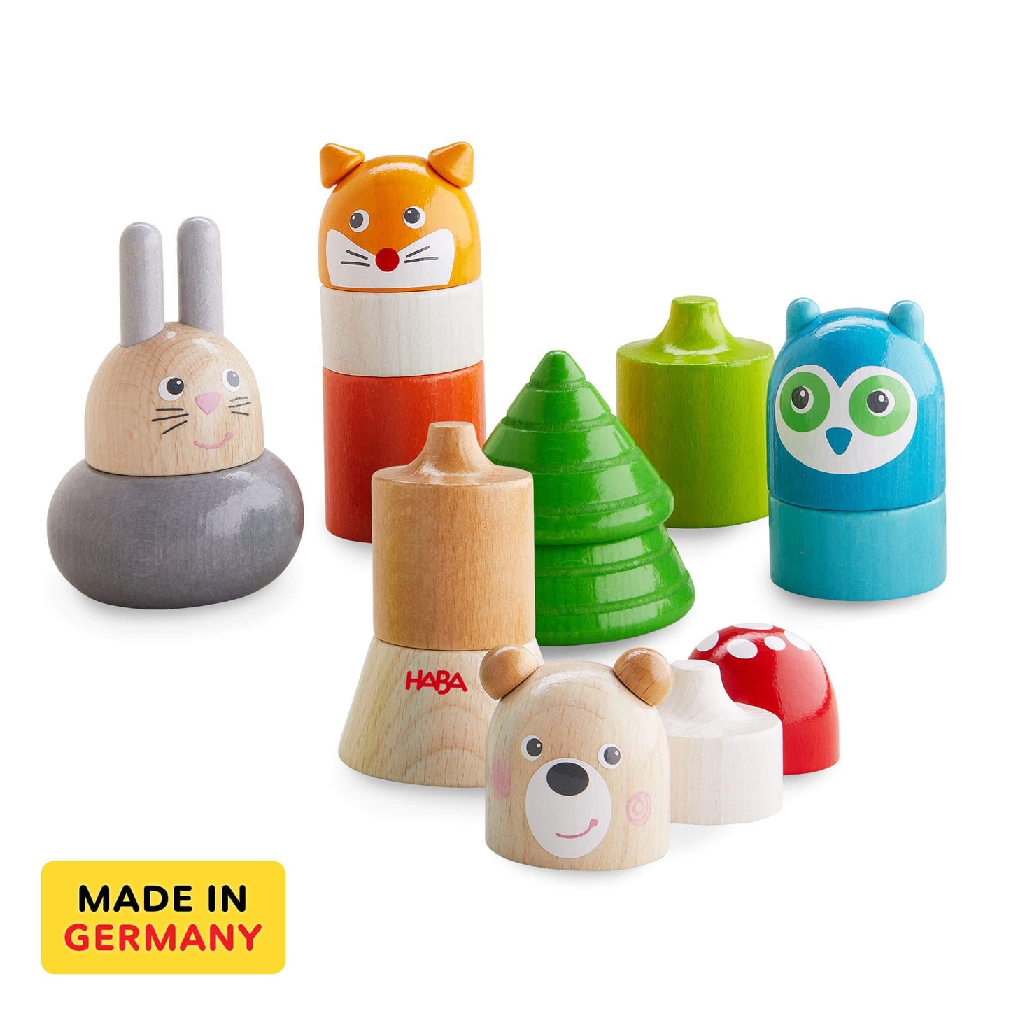 Set of wooden toys with animal designs on a white background, featuring the HABA brand.