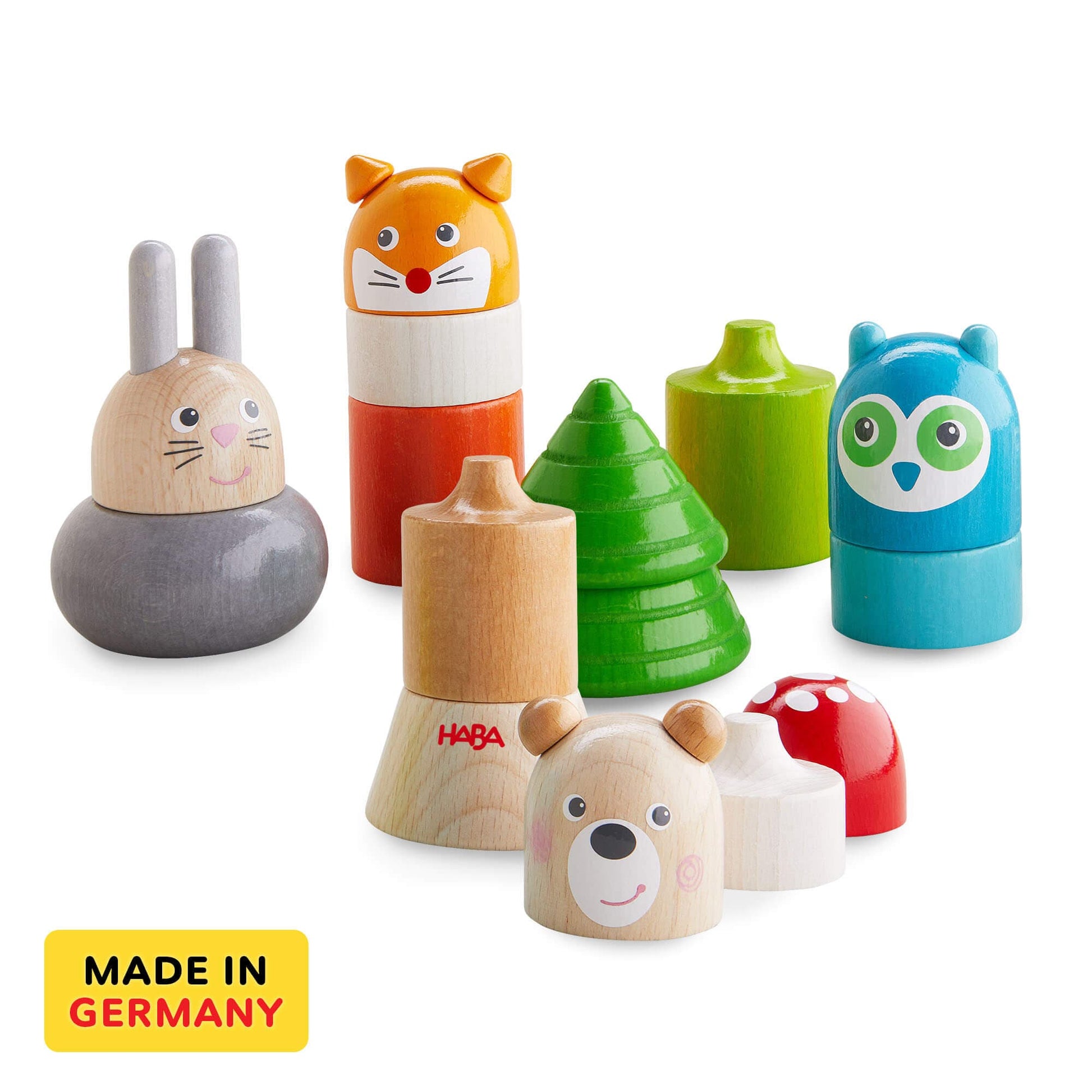Set of wooden toys with animal designs on a white background, featuring the HABA brand.