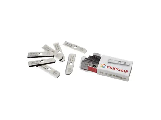 Stockmar sharpener replacement blades spilling out of the box on a white background