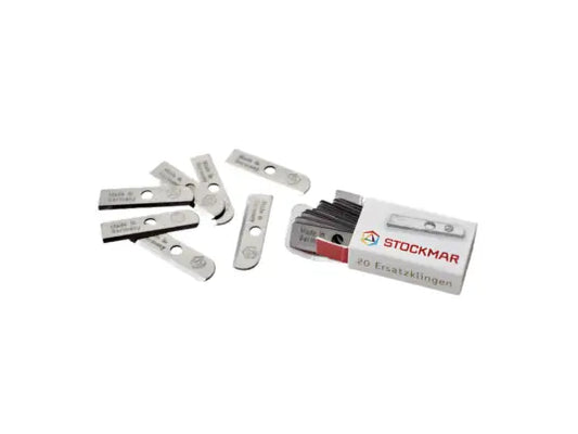 Stockmar sharpener replacement blades spilling out of the box on a white background