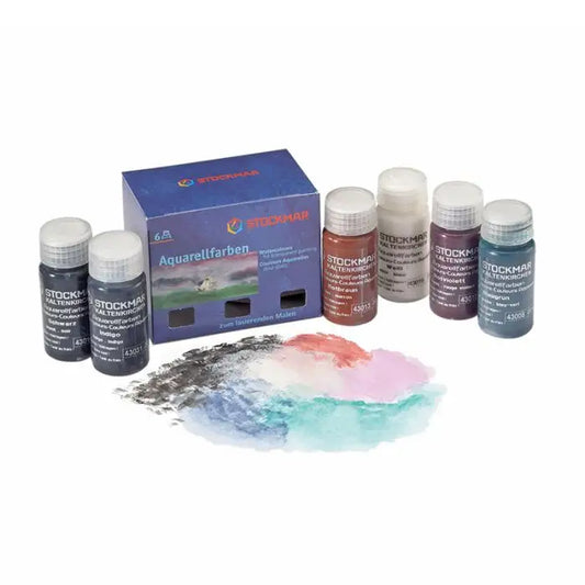 Set of Stockmar watercolor paints with a blue box on a white background