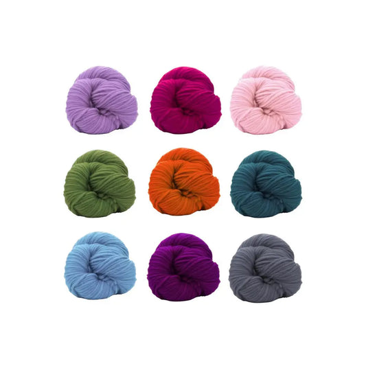 Nine skeins of colorful yarn in various shades on a white background