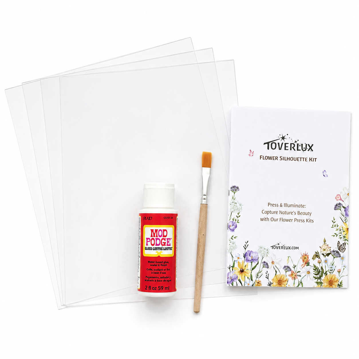 Toverlux Flower Silhouette Kit with translucent sheets, adhesive, brush, and instruction manual on a white background