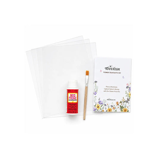 Toverlux Flower Silhouette Kit with translucent sheets, adhesive, brush, and instruction manual on a white background