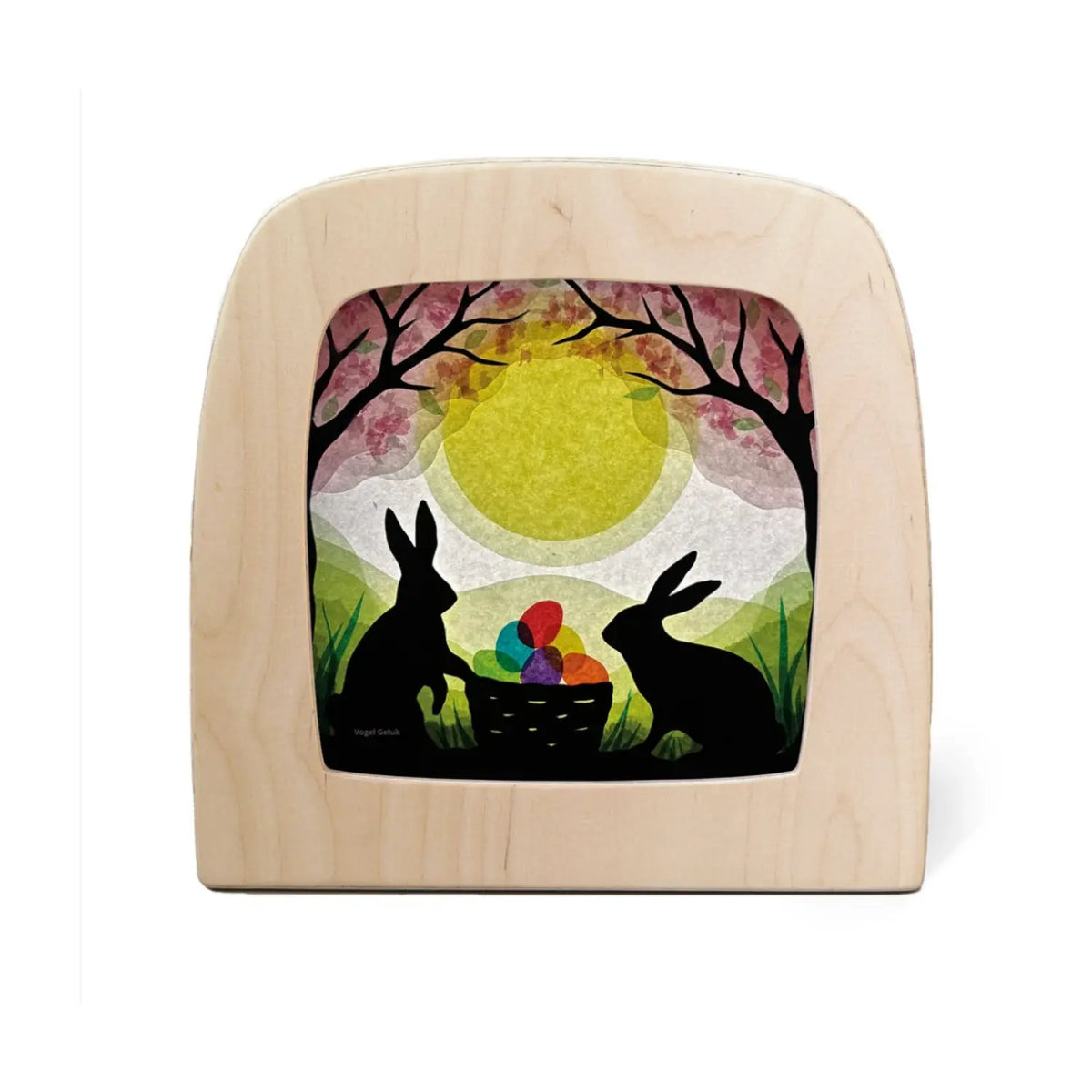 Toverlux Magic Lamp Easter silhouette showing layered rabbits, eggs, spring trees, and a basket