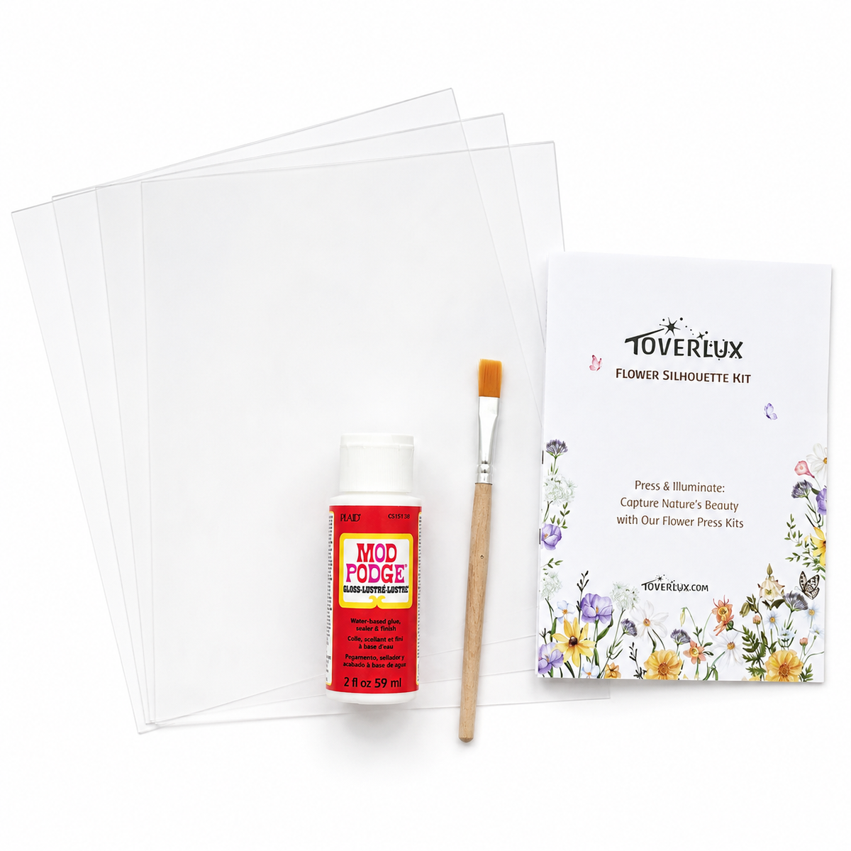 Toverlux Flower Silhouette Kit with translucent sheets, adhesive, brush, and instruction manual on a white background