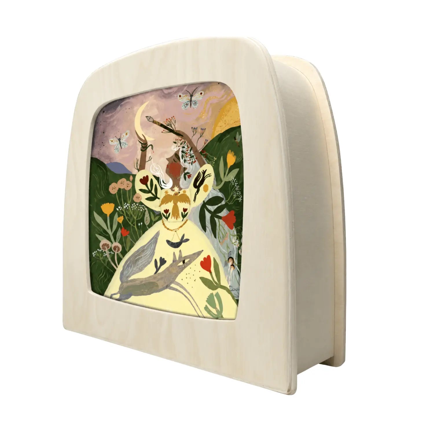 Toverlux Wand Making Silhouette by Tijana Draws with botanical and moonlit artwork displayed in an angled Toverlux Lamp
