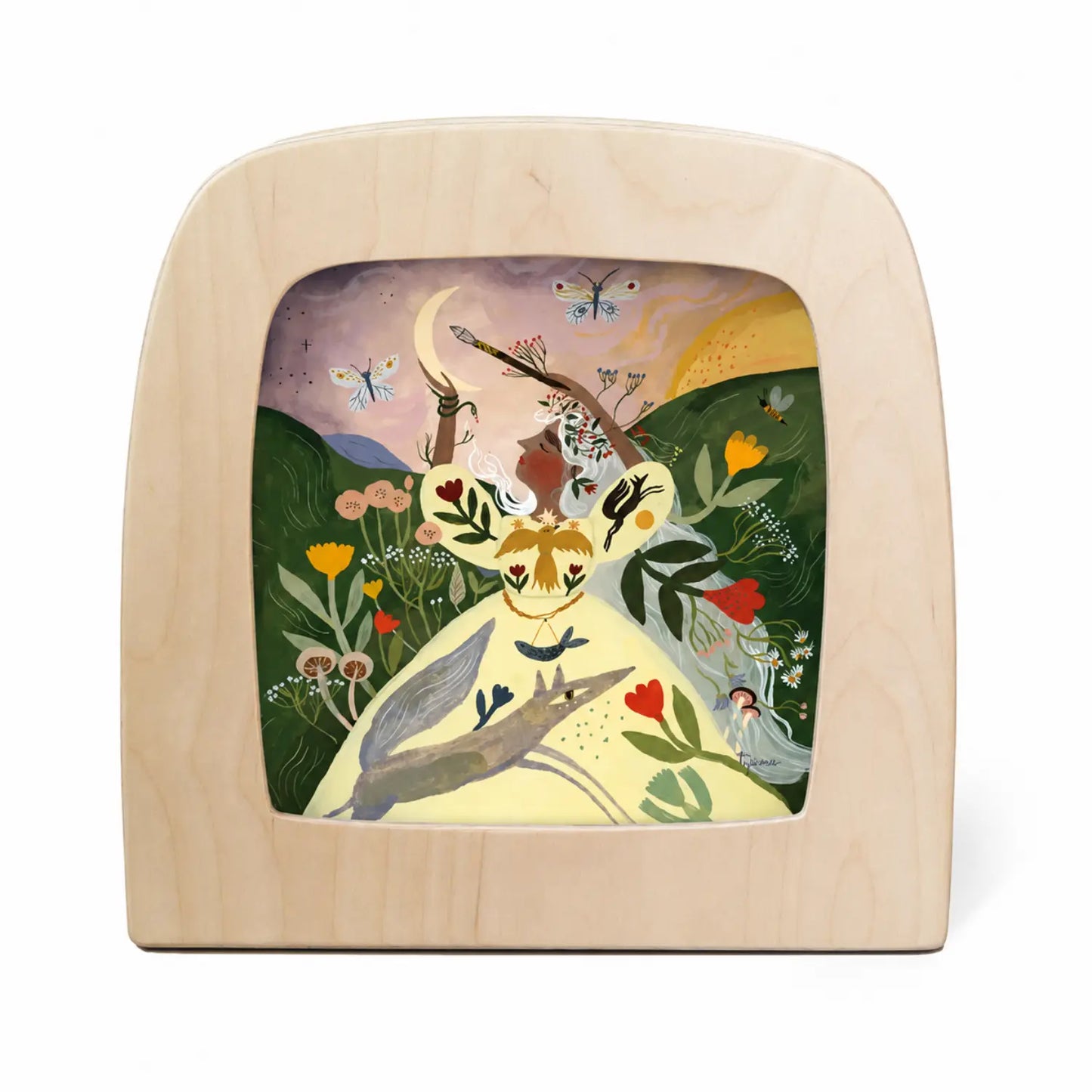 Toverlux Wand Making Silhouette by Tijana Draws with botanical and moonlit artwork displayed in a Toverlux Lamp