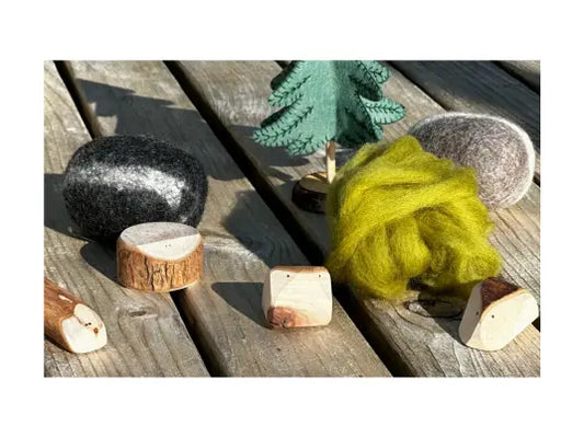 Tree Creatures wooden figures with wool, stones, and natural materials for small-world play