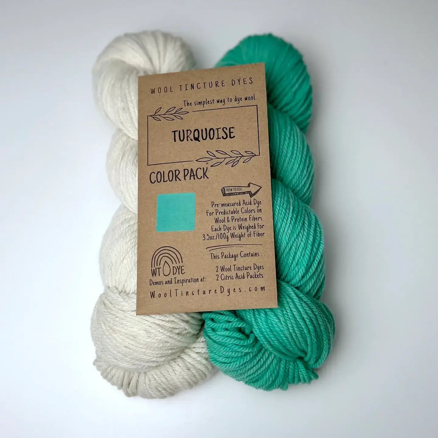 Turquoise Wool Tincture tea bag dye color pack with undyed yarn and bright turquoise sample color.