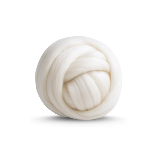 Undyed Merino wool combed top spinning fiber in natural cream on a white background