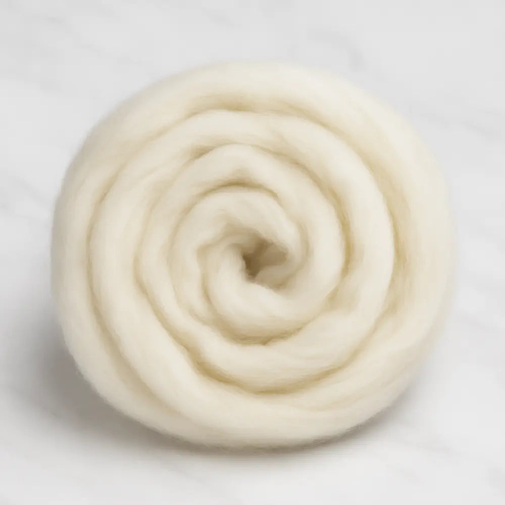 Rambouillet Wool Combed Top roving rolled into a ball