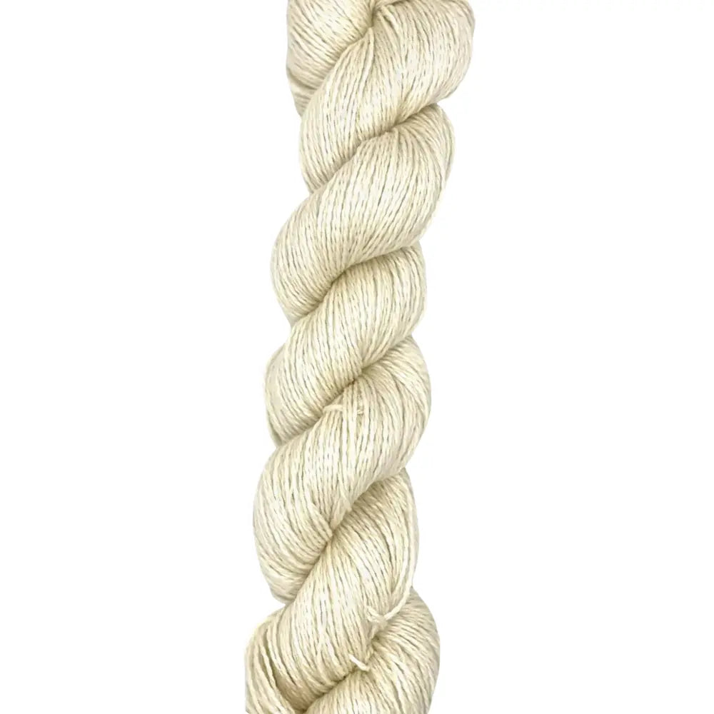Close-up texture of undyed superwash merino silk cashmere yarn blend