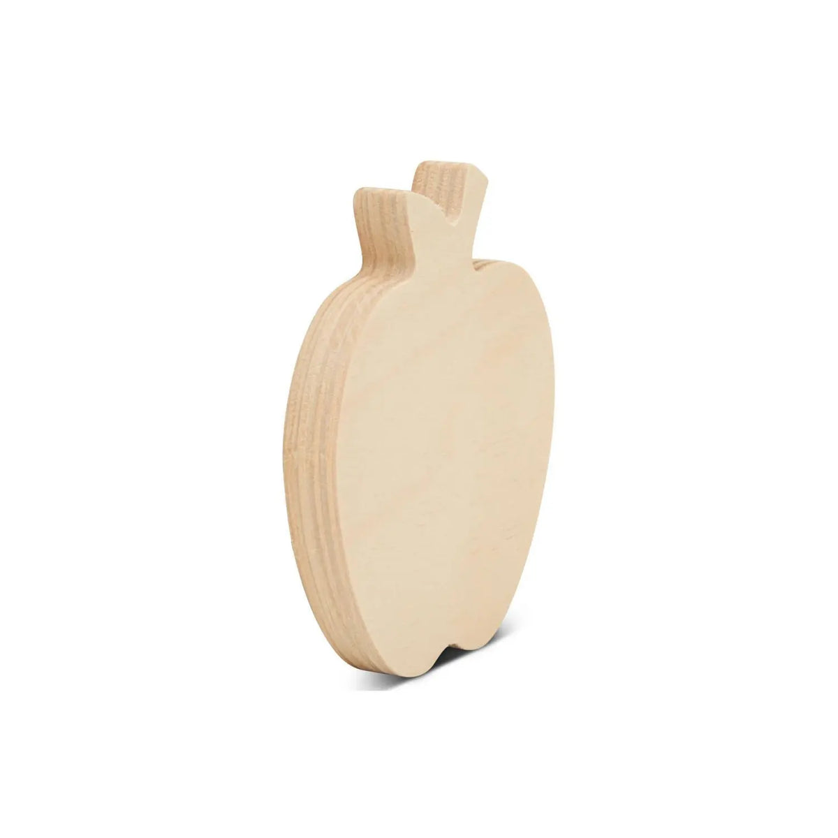 Angled view of unfinished birch wood apple showing its freestanding 1/2 inch thickness