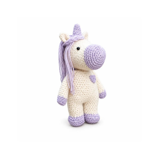 Finished handmade crocheted unicorn stuffed animal from a DIY crochet kit