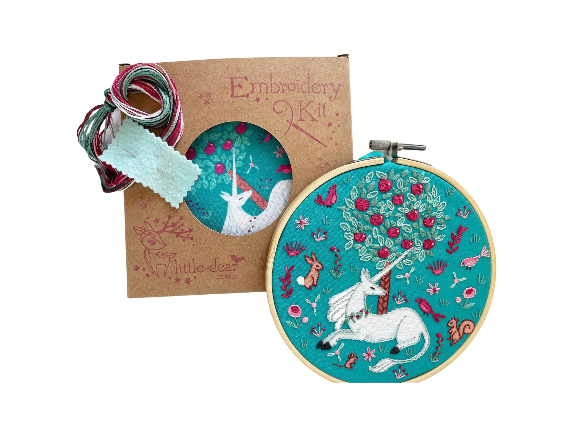 Unicorn embroidery kit with hoop and materials on a white background