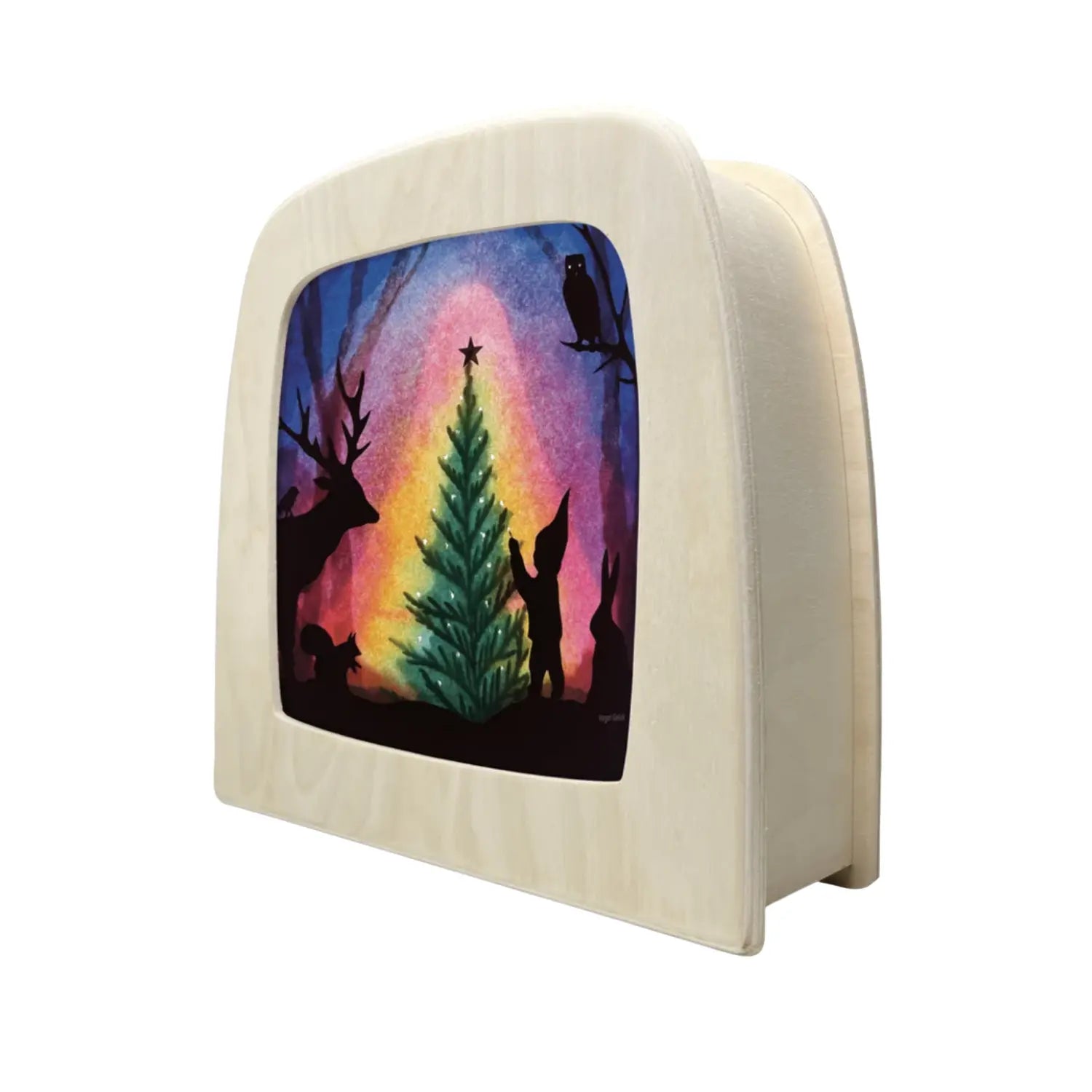 Toverlux Christmas Tree Silhouette by Vogel Geluk displayed in the Magic Lamp at an angle with woodland animals gathered around a glowing evergreen