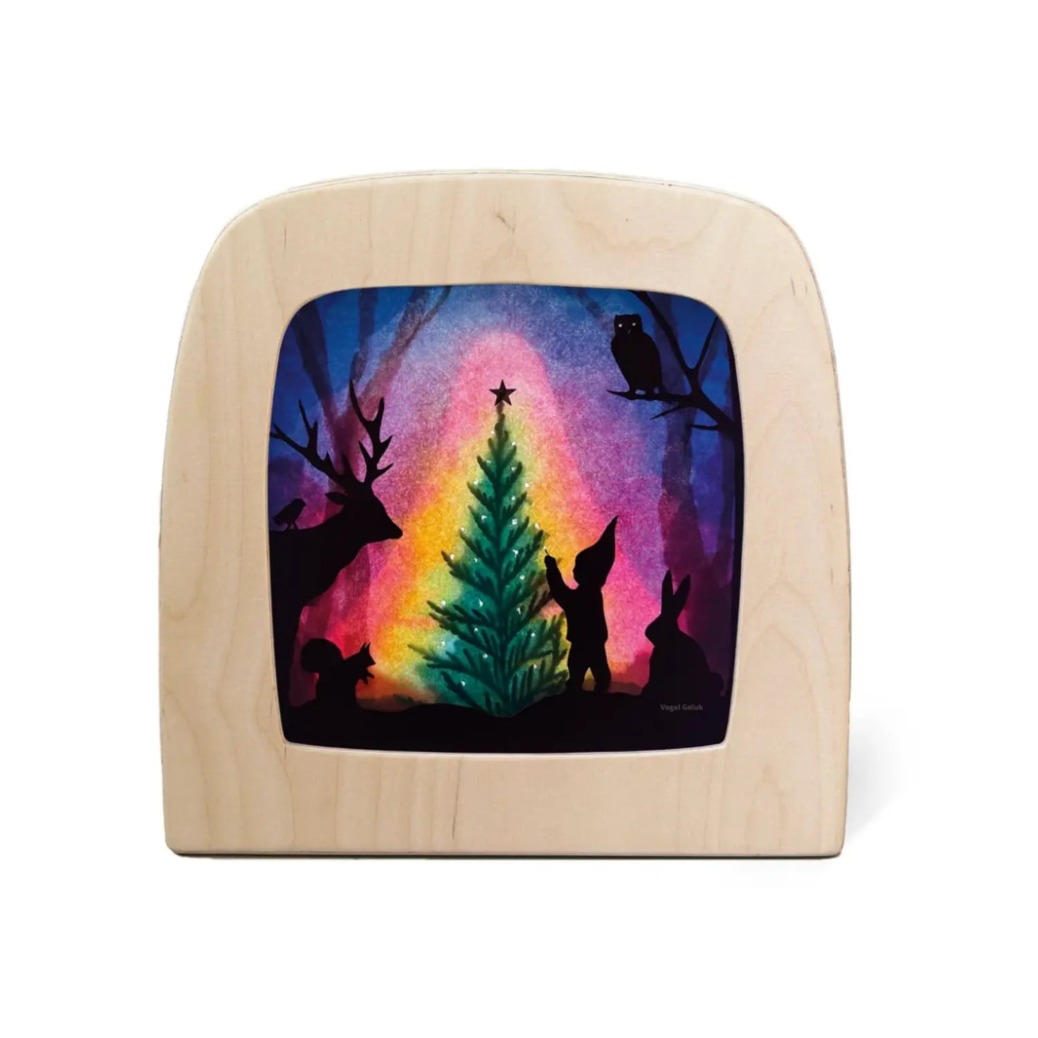 Toverlux Christmas Tree Silhouette by Vogel Geluk displayed in the Magic Lamp with woodland animals gathered around a glowing evergreen