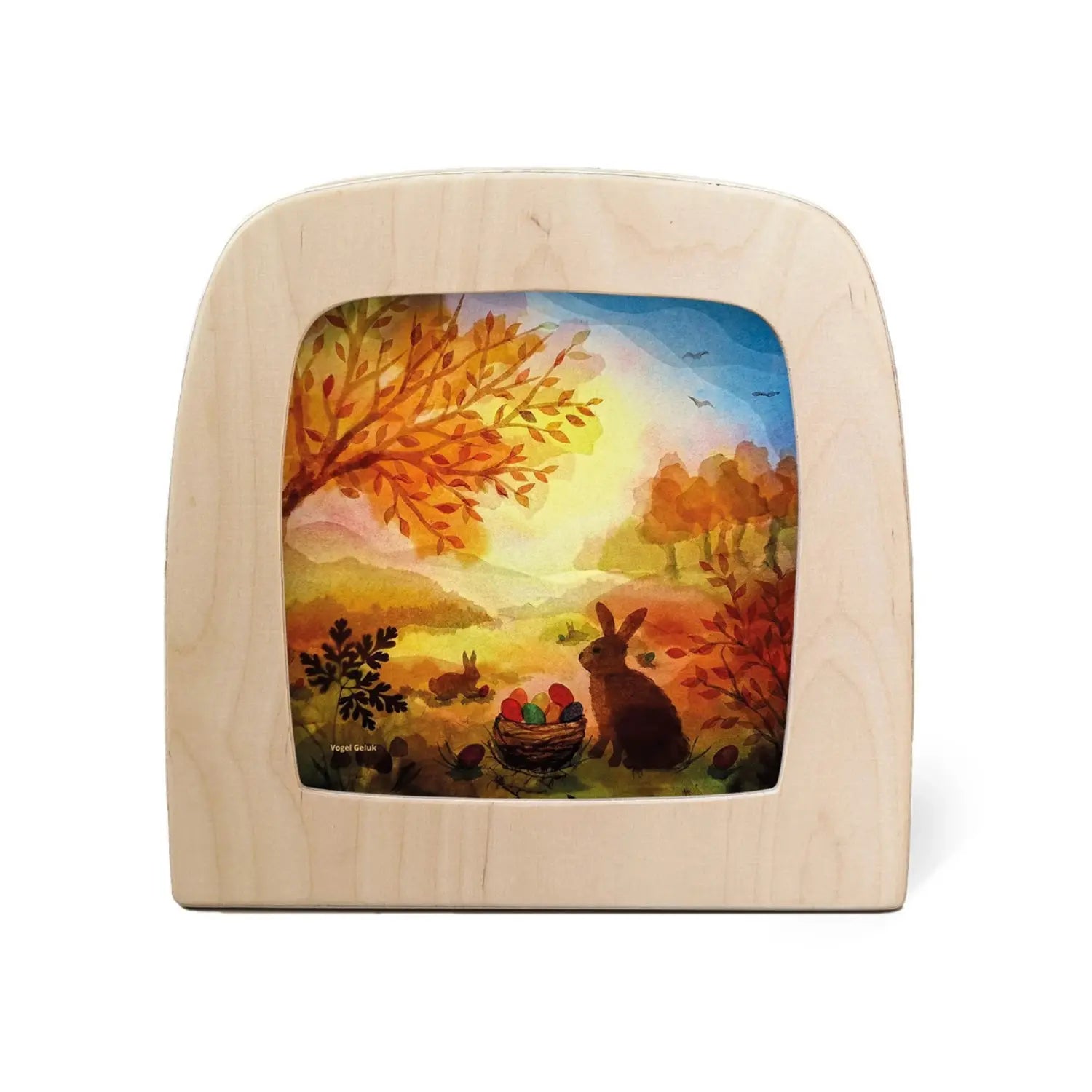 Toverlux Easter Basket Silhouette by Vogel Geluk with rabbits and colorful eggs displayed in a Toverlux Lamp