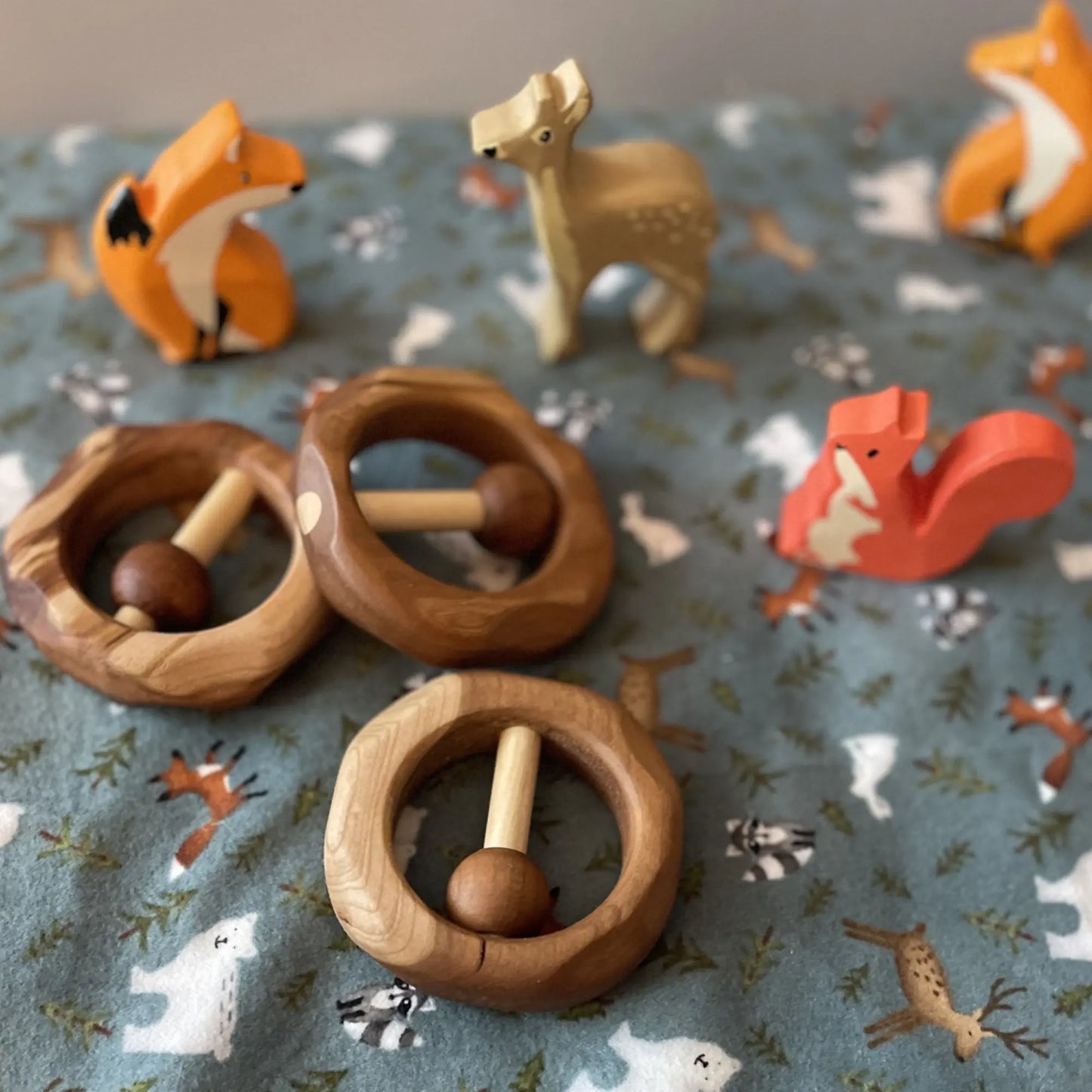 Cherry wood baby rattles for Waldorf-inspired sensory play