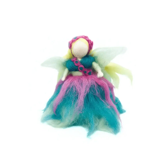 Colorful fairy figurine on a white background