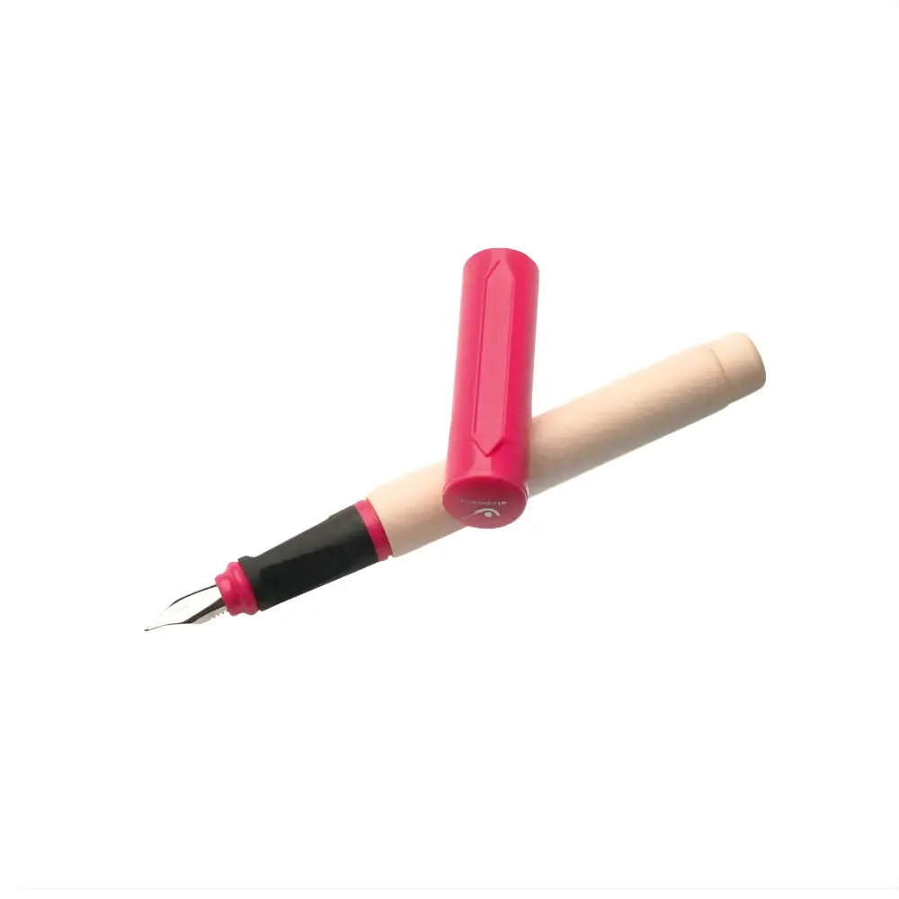 Fountain pen with pink accents on a white background