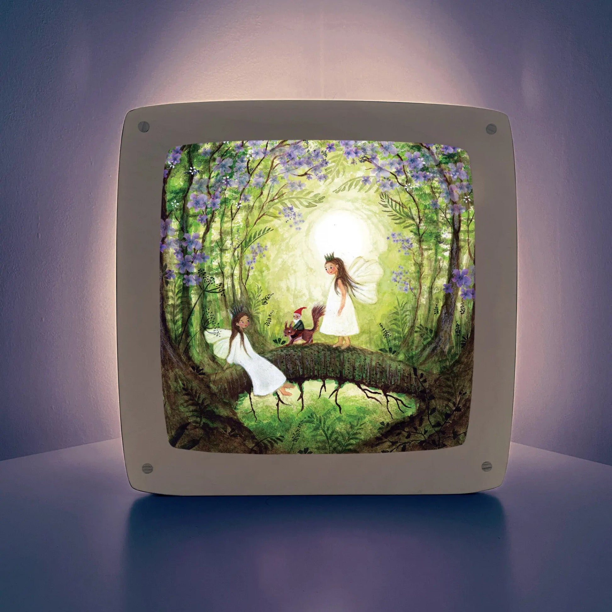 Framed lamp plate with two fairies, a gnome, and squirrel on a purple background