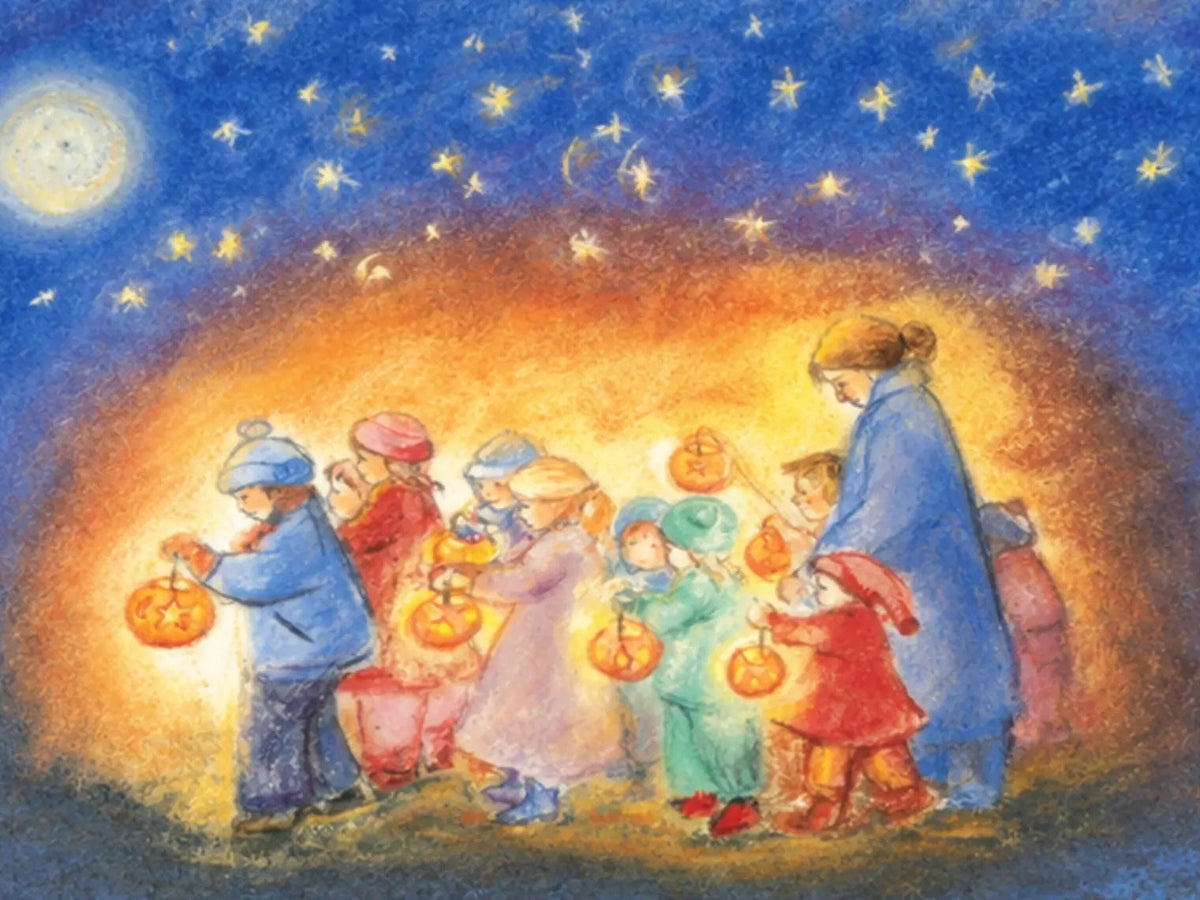 Children walking with lanterns for a Waldorf Martinmas celebration. 
