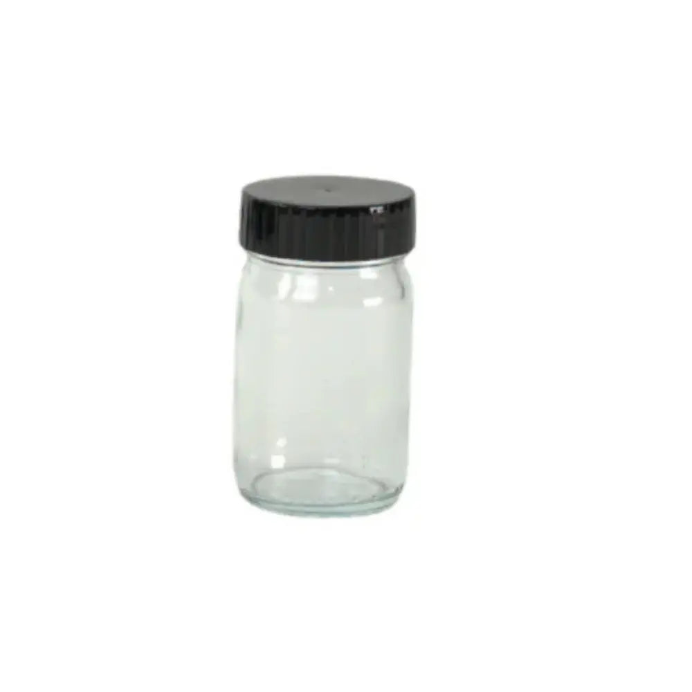 Clear glass jar with a black lid on a white background