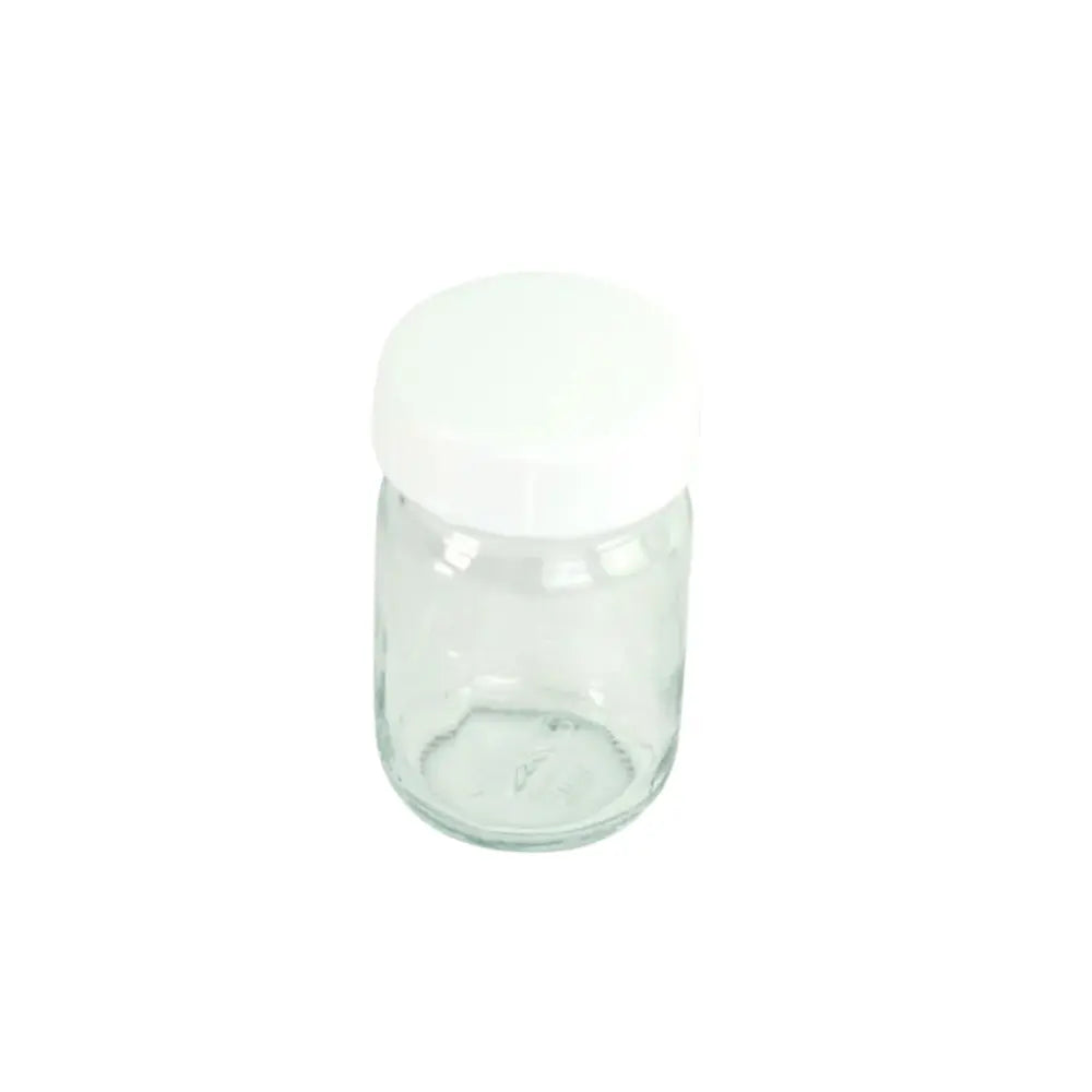 Clear glass jar with a white lid on a white background