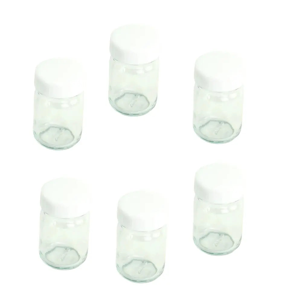 Set of six white socks with green accents on a white background