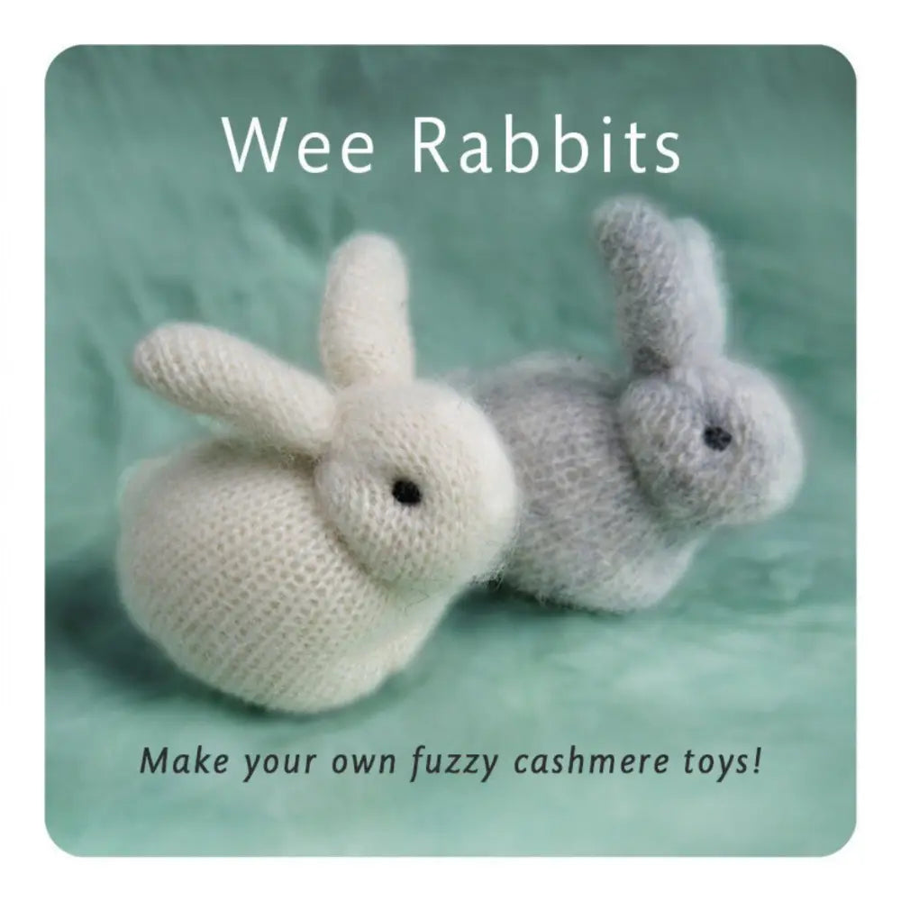 Two knitted rabbit toys on a green background with text 'Wee Rabbits' and 'Make your own fuzzy cashmere toys!'.