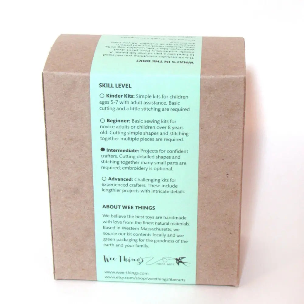 Cardboard box with a green label detailing skill levels and brand information on a white background