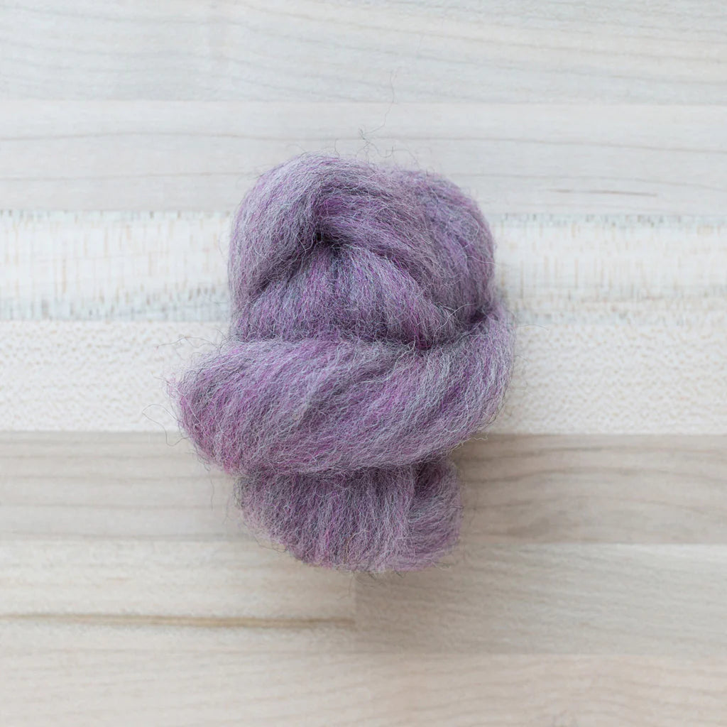 Wisteria Lilac Wool Roving Felter's Flowing on tabletop