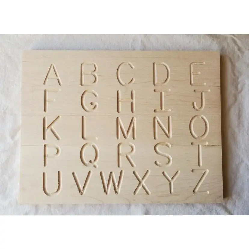 Wooden alphabet block set on a white background