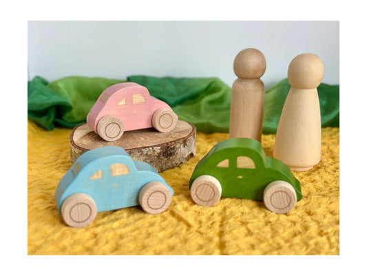 Wooden beetle toy cars in blue, pink, and green for imaginative play