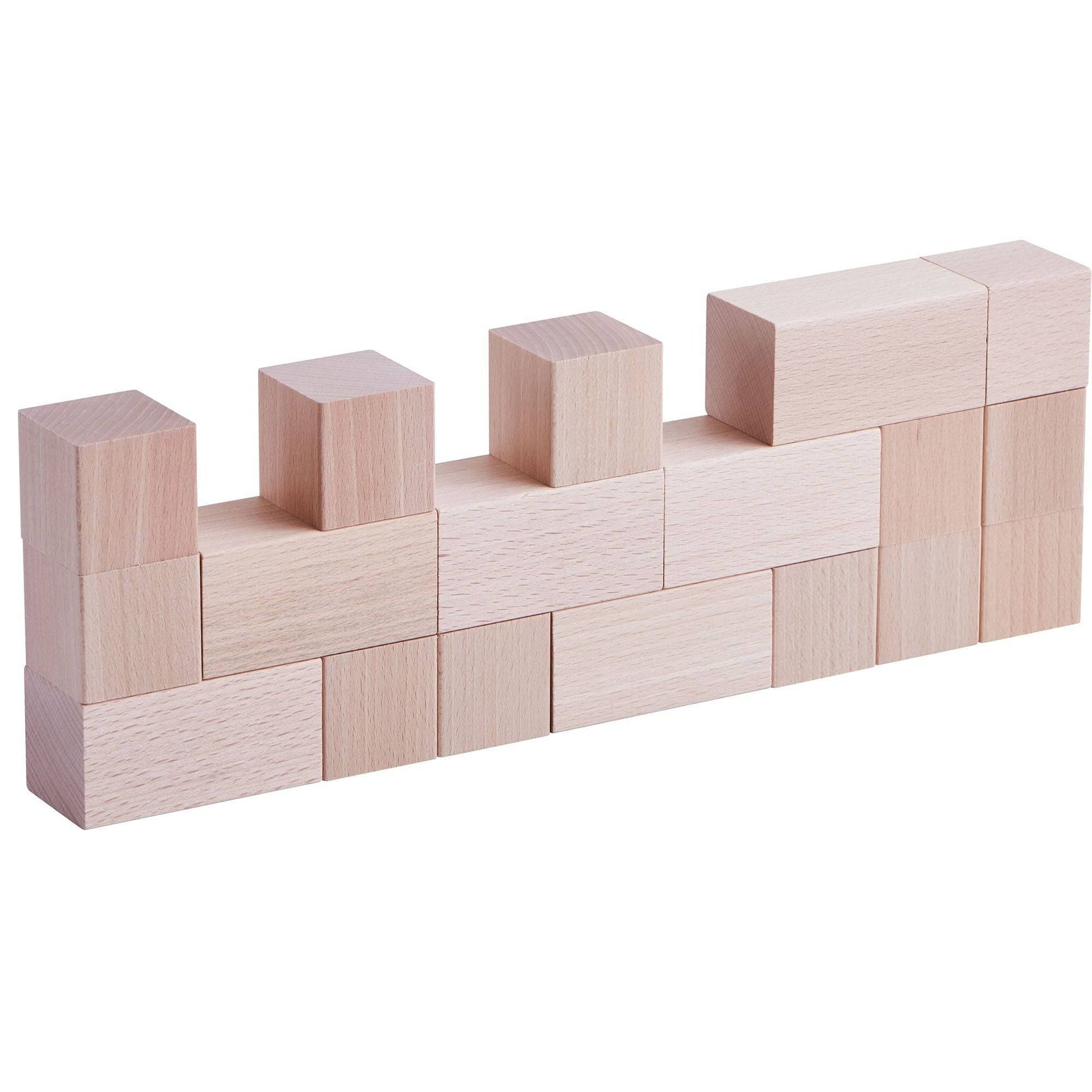 Wooden building blocks arranged in a linear balance pattern with cubes and rectangular blocks