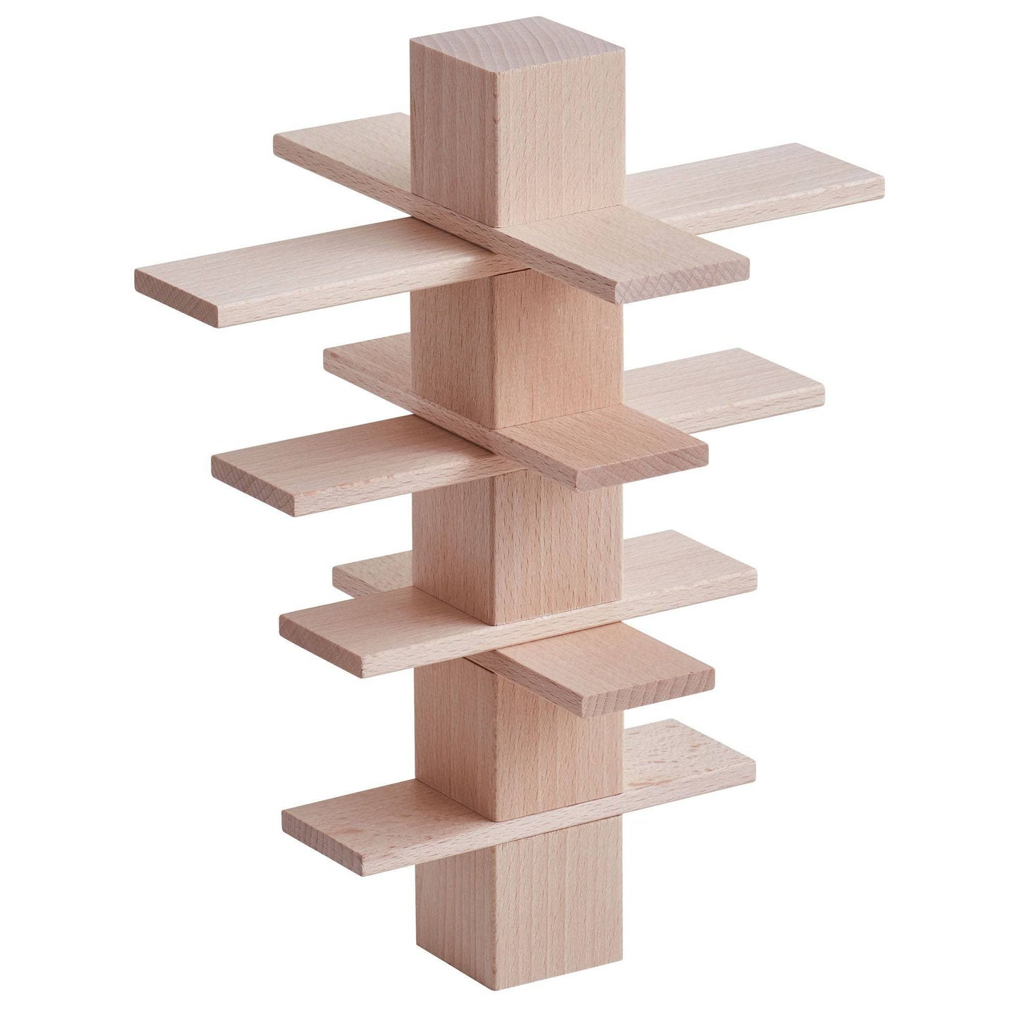 Tall vertical tower made from stacked wooden building blocks and flat panels