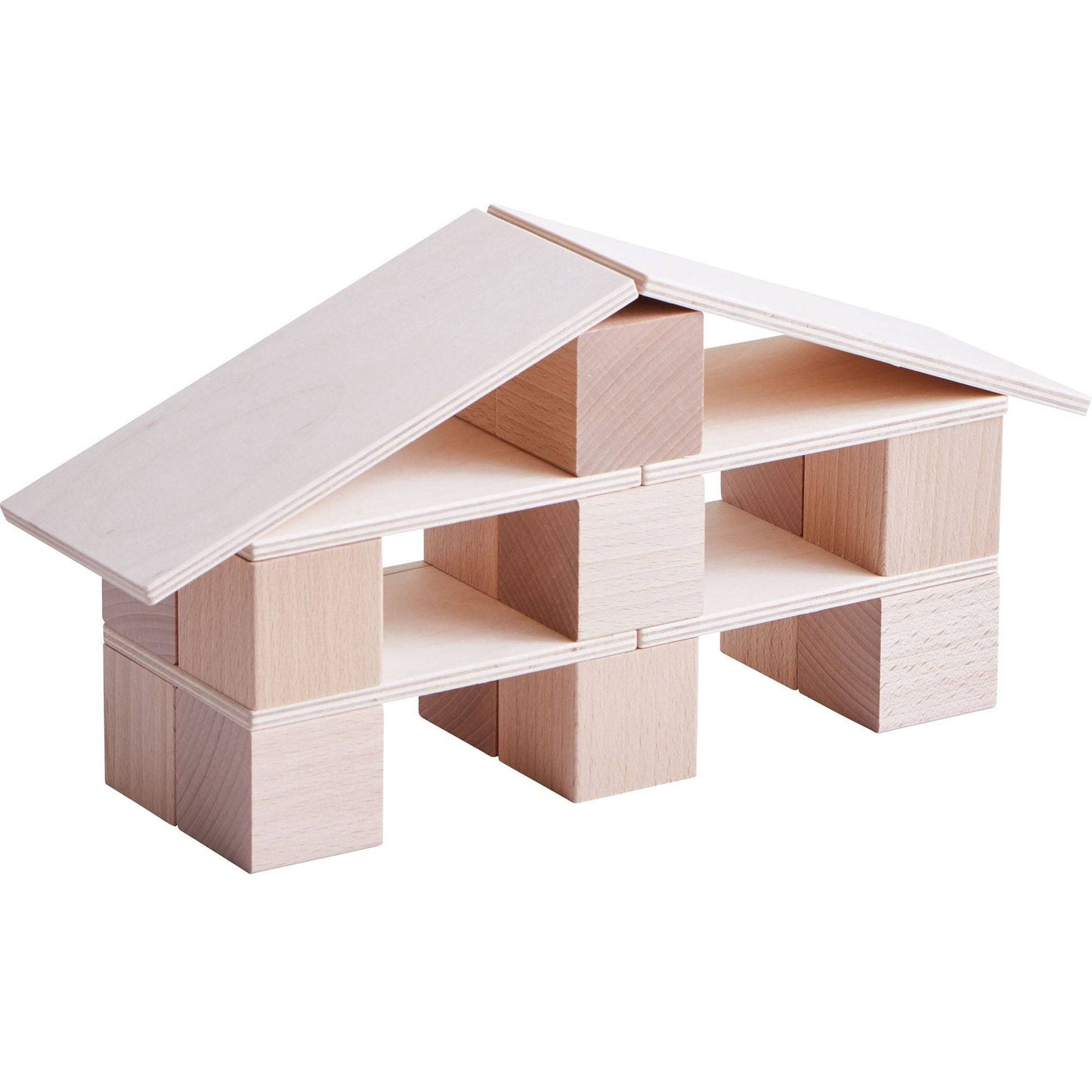 Wooden building blocks arranged into a simple house structure with slanted roof