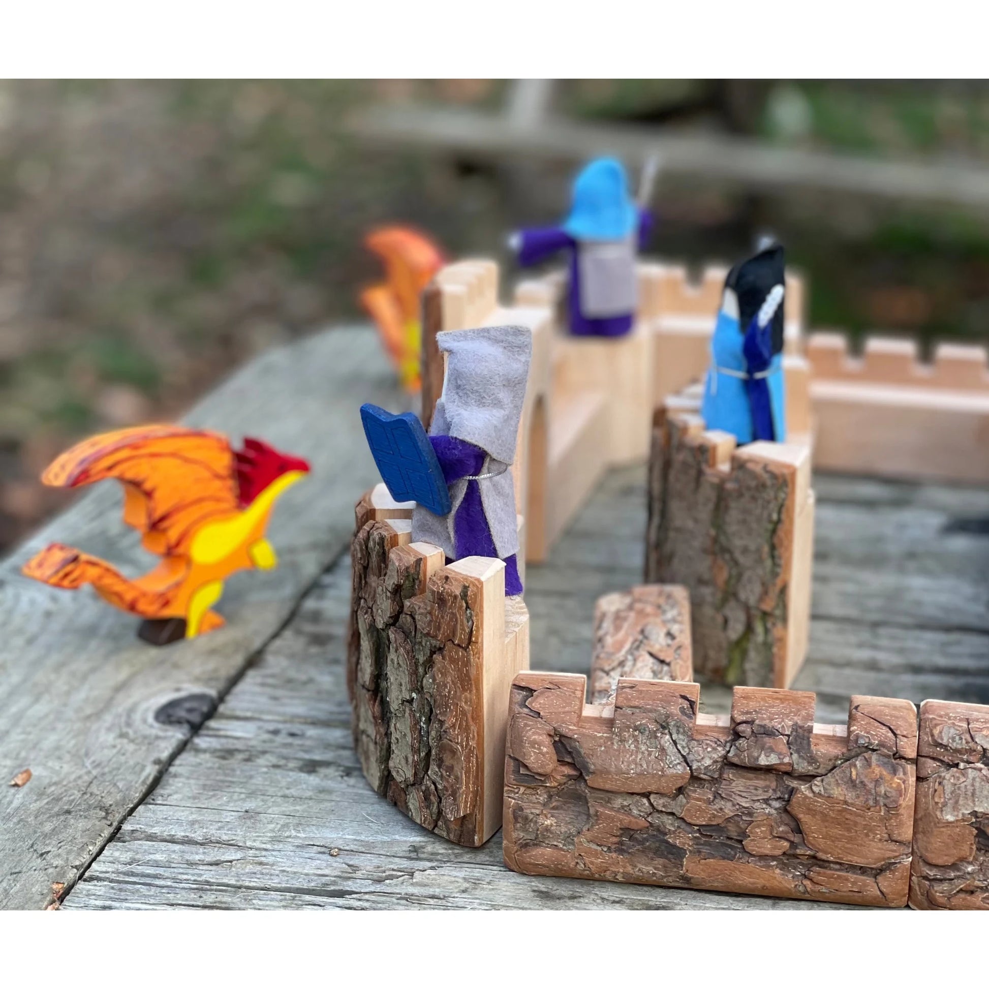 Working gatehouse and castle walls of a natural wooden castle building set