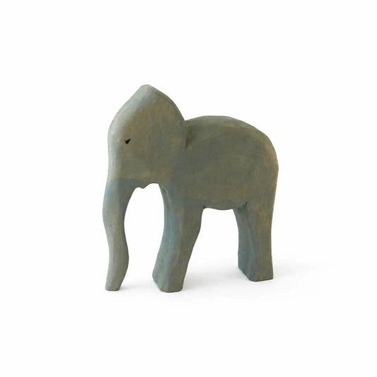 Small gray wooden elephant toy on a white background