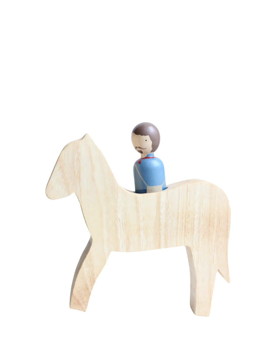 Wooden horse with a rider on a white background