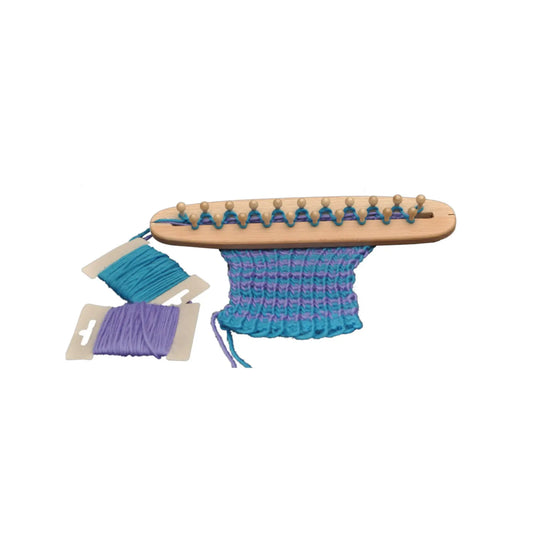 Wooden knitting loom by Fagus with blue and purple yarn on a white background