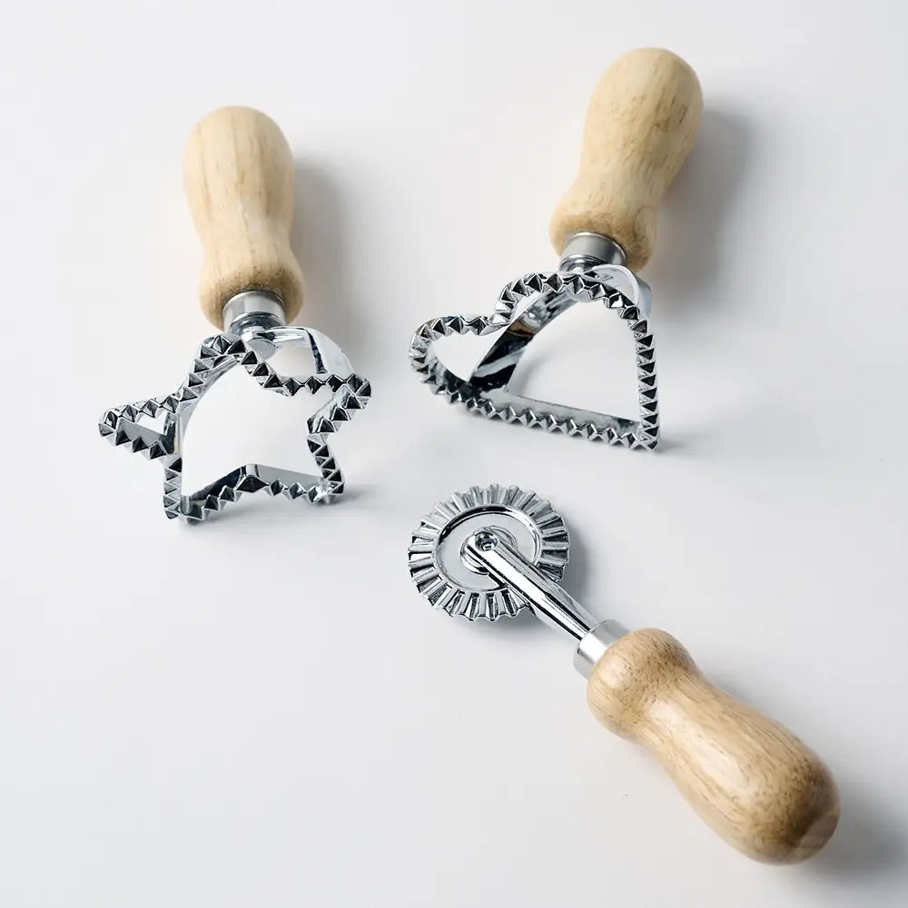 Wooden and metal dough cutters with star, heart, and rolling wheel for play dough sensory play